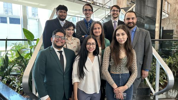 Diplomacy Lab students standing together at the State Department stairs.